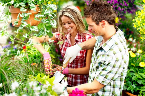 Gardener tending to plants